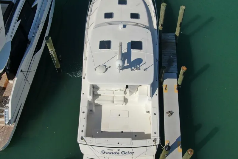 Grande Gator Yacht Photos Pics Aerial view of 2004 Tiara Yachts 4200 Open docked at marina.
