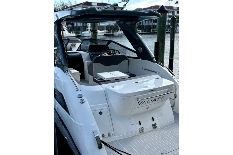  Yacht Photos Pics 2025 Valiatt 350GT luxury yacht docked at marina, showcasing sleek design and modern features.