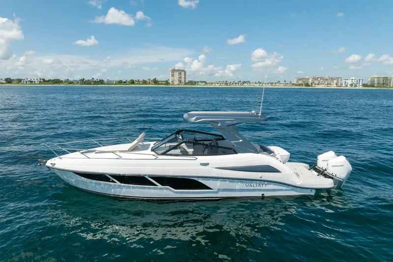  Yacht Photos Pics 2025 Valiatt 350GT luxury boat cruising on open water under a clear sky.