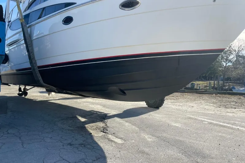 Good Times Yacht Photos Pics 2004 Meridian 459 Motoryacht on trailer, showcasing sleek hull design.