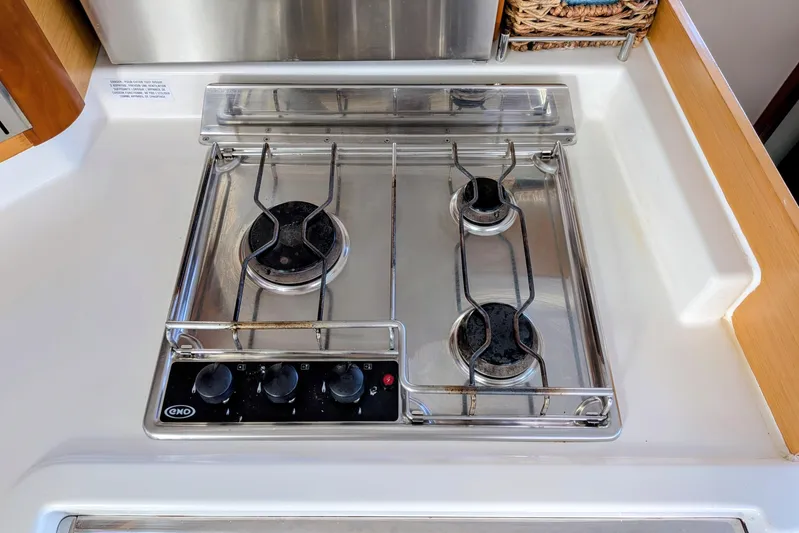 Imany Yacht Photos Pics Stainless steel three-burner stove on 2012 Fountaine Pajot Lipari Owners Version yacht.