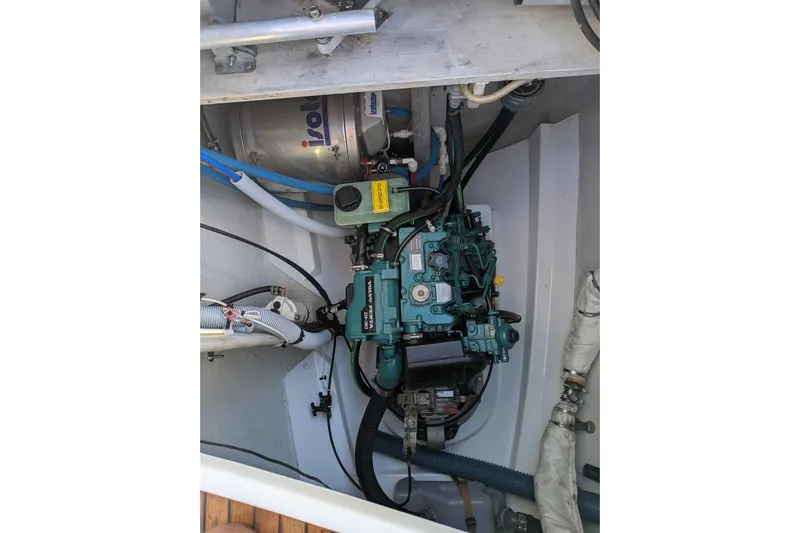 Imany Yacht Photos Pics Engine compartment of 2012 Fountaine Pajot Lipari catamaran, showcasing mechanical components.