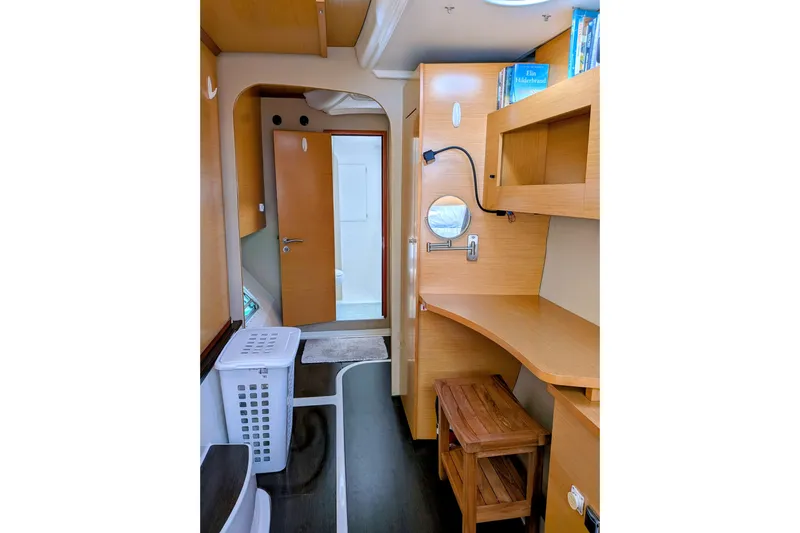 Imany Yacht Photos Pics Interior of 2012 Fountaine Pajot Lipari catamaran with wooden cabinetry and modern design.