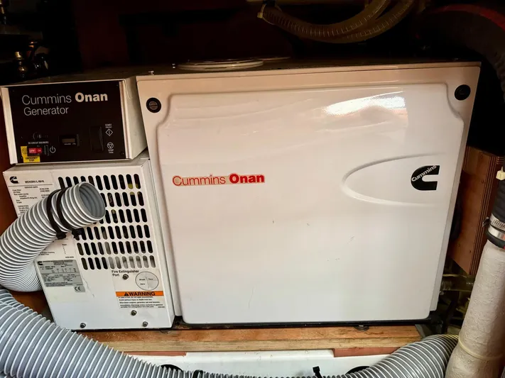  Yacht Photos Pics Cummins Onan generator in a 2013 Beneteau Sense 55 yacht engine room.