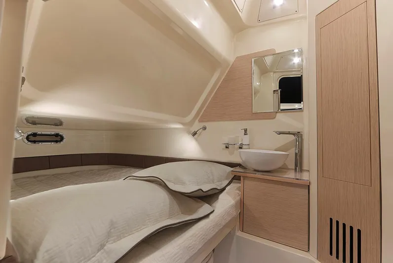  Yacht Photos Pics Manufacturer Provided Image: 2020 Chris-Craft Catalina 30 cabin interior with bed and sink.