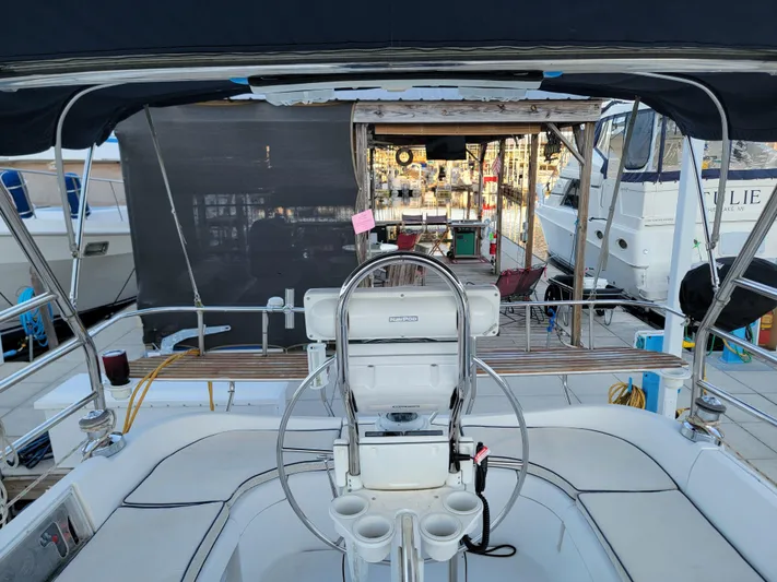 Scuba Duo Yacht Photos Pics Cockpit view of 2004 Hunter 41 AC sailboat docked at marina.