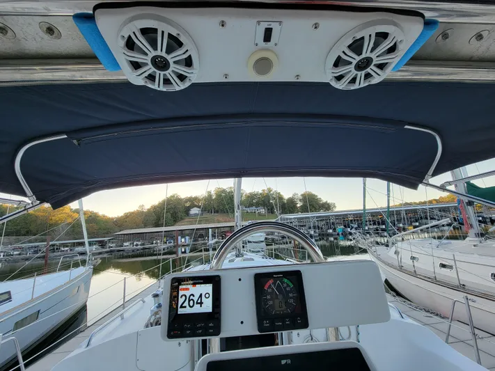 Scuba Duo Yacht Photos Pics Cockpit view of 2004 Hunter 41 AC sailboat with navigation instruments and speakers.