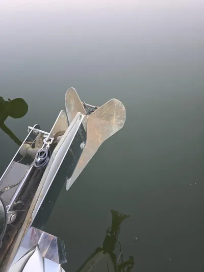 Scuba Duo Yacht Photos Pics Anchor of 2004 Hunter 41 AC sailboat over calm water.