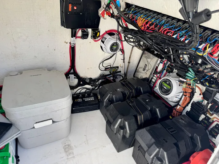  Yacht Photos Pics Electrical system and storage area of 2023 Twin Vee 280 GFX CC boat.