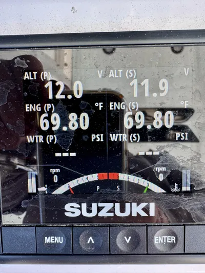  Yacht Photos Pics Suzuki engine display showing altimeter, engine temperature, and water pressure on a 2023 Twin Vee 280 GFX CC.
