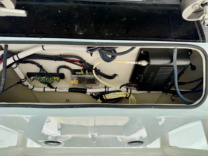  Yacht Photos Pics 2023 Twin Vee 280 GFX CC boat wiring and electronics compartment.