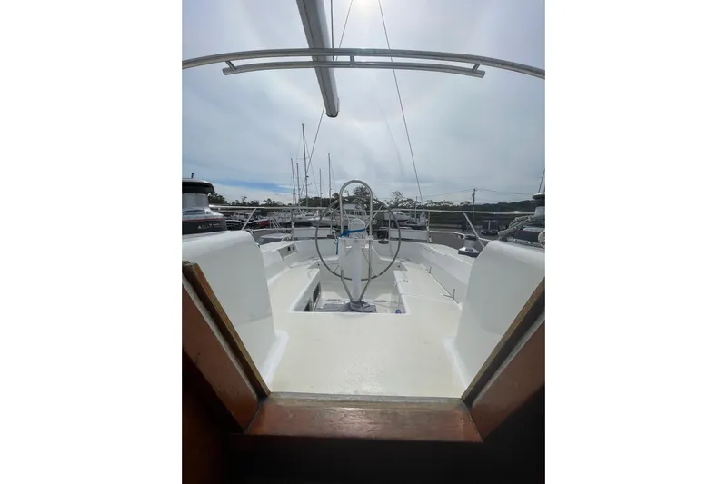 Spray Yacht Photos Pics 2002 Tartan 37 sailboat cockpit with steering wheel and deck view.