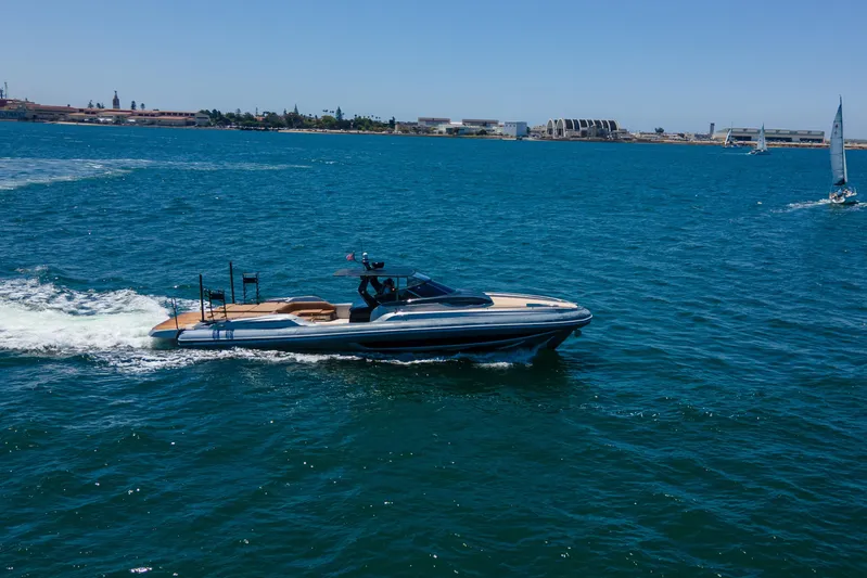 Quikwood Yacht Photos Pics 2014 SACS Strider yacht cruising on blue ocean waters under clear skies.