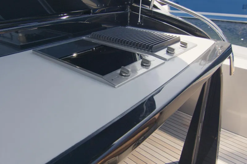 Quikwood Yacht Photos Pics 2014 SACS Strider yacht with sleek outdoor kitchen and modern grill setup.