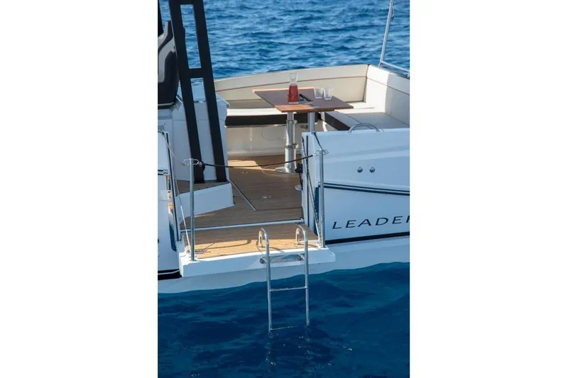  Yacht Photos Pics 2026 Jeanneau Leader 9.0 WA Series 2 boat with deck and swim ladder.