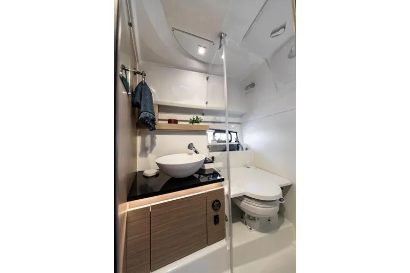  Yacht Photos Pics Modern bathroom in 2026 Jeanneau Leader 9.0 WA Series 2 boat, featuring sleek design and amenities.