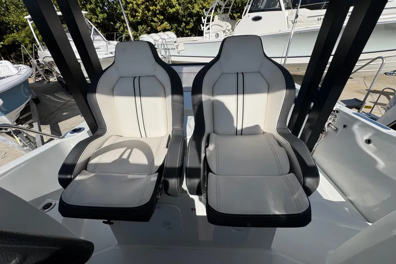  Yacht Photos Pics Luxury seating on 2026 Jeanneau Leader 9.0 WA Series 2 boat, featuring sleek design.