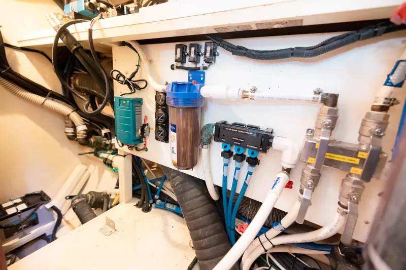  Yacht Photos Pics Engine room of 2009 Nordhavn 56 Motorsailer with complex plumbing and wiring systems.