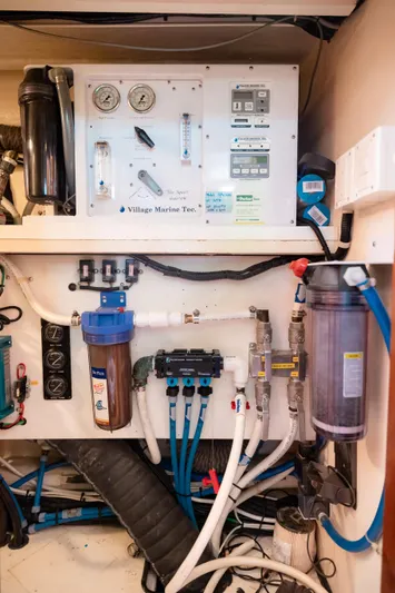  Yacht Photos Pics Water filtration system in a 2009 Nordhavn 56 Motorsailer yacht, featuring gauges and filters.