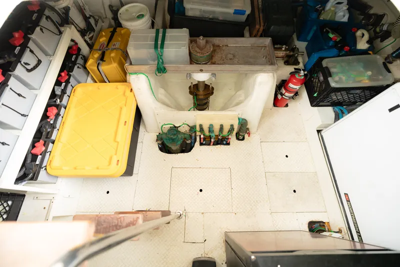  Yacht Photos Pics Engine room of a 2009 Nordhavn 56 Motorsailer with organized equipment and storage.