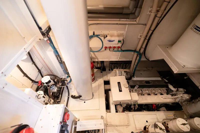  Yacht Photos Pics Engine room of 2009 Nordhavn 56 Motorsailer, showcasing mechanical components and piping.