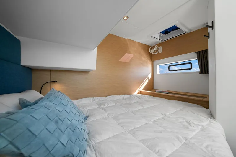 Halcyon Yacht Photos Pics 2024 Fountaine Pajot Aura 51 Catamaran bedroom with modern design and natural light.