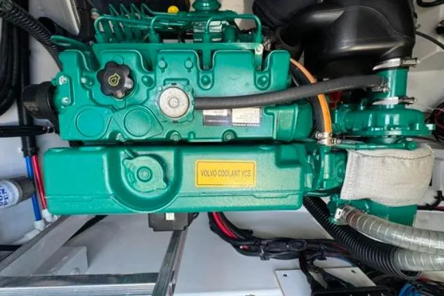 Halcyon Yacht Photos Pics Engine compartment of 2024 Fountaine Pajot Aura 51 Catamaran with Volvo coolant system.