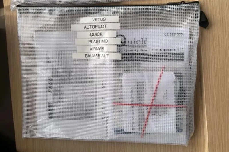 Halcyon Yacht Photos Pics Mesh pouch containing manuals for Fountaine Pajot Aura 51 Catamaran, 2024 model.