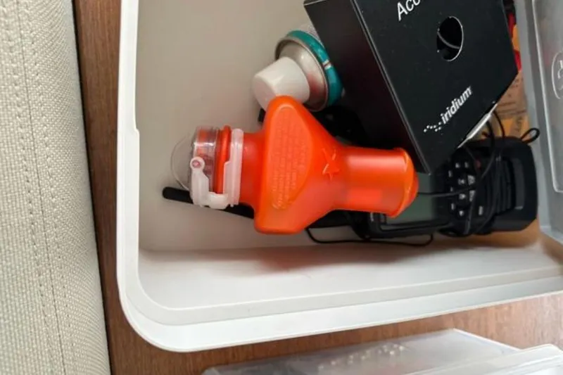 Halcyon Yacht Photos Pics Drawer with safety equipment and electronics on 2024 Fountaine Pajot Aura 51 Catamaran.