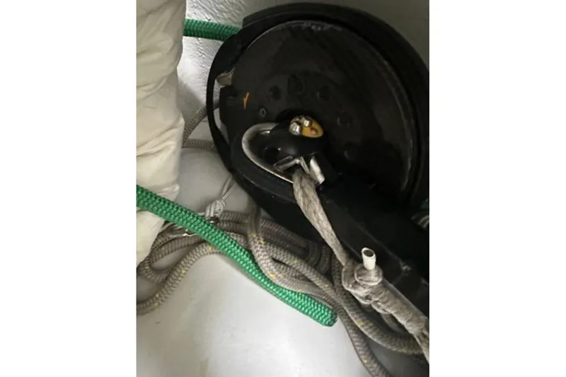 Halcyon Yacht Photos Pics Close-up of rigging on 2024 Fountaine Pajot Aura 51 Catamaran, featuring ropes and pulleys.