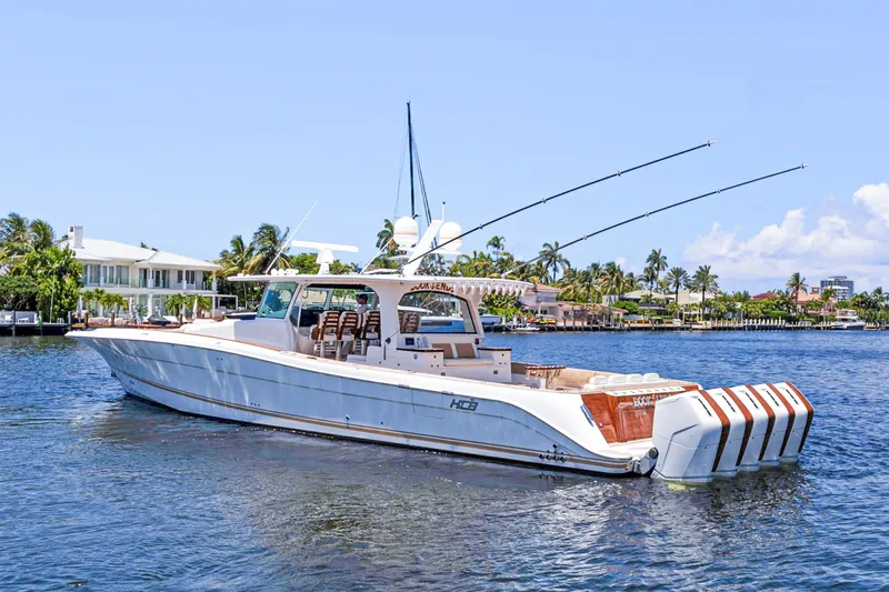 Book Ends Yacht Photos Pics 2021 HCB Estrella yacht on water, featuring multiple outboard engines and luxury design.