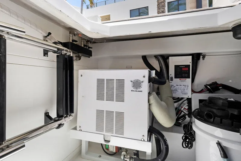 Book Ends Yacht Photos Pics 2021 HCB Estrella engine compartment with electrical components and wiring.