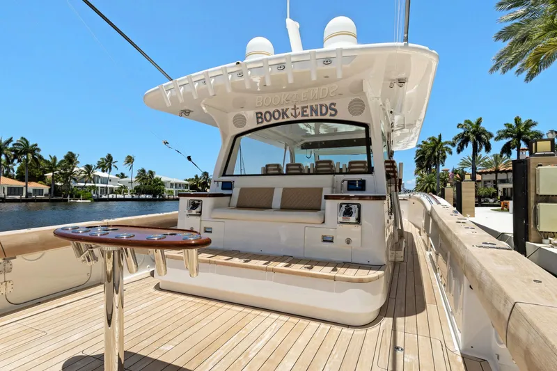 Book Ends Yacht Photos Pics Luxury 2021 HCB Estrella yacht docked, featuring spacious deck and elegant seating.