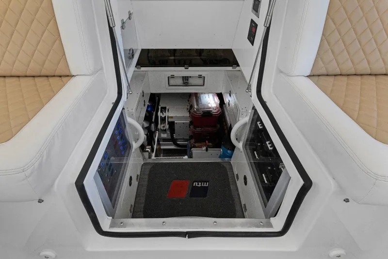 Book Ends Yacht Photos Pics 2021 HCB Estrella interior with beige seating and visible control panels.