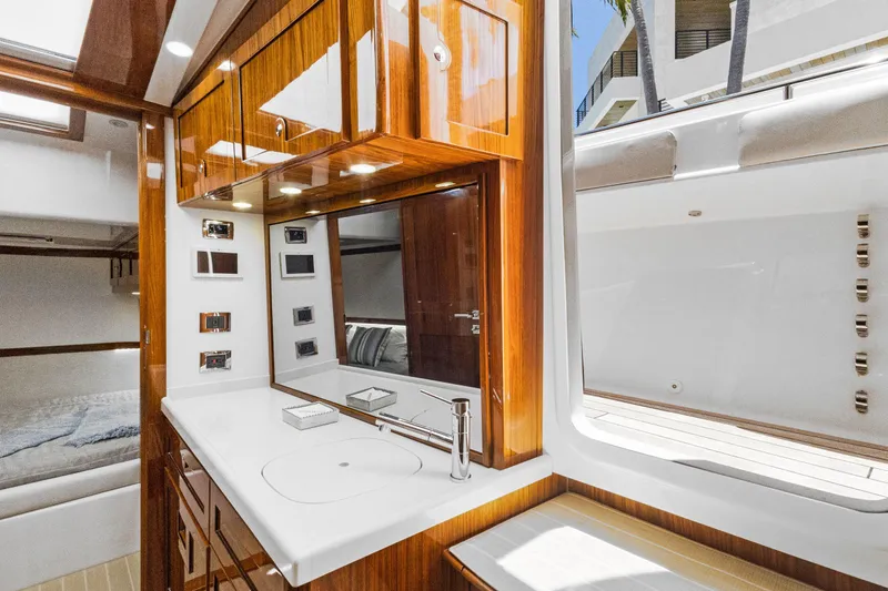 Book Ends Yacht Photos Pics Luxurious interior of 2021 HCB Estrella yacht with elegant wood finishes and modern amenities.