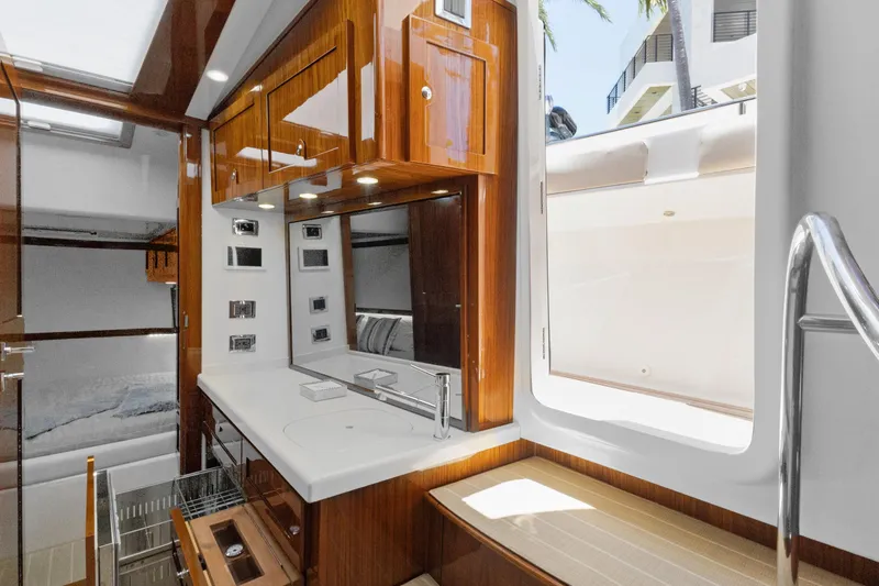 Book Ends Yacht Photos Pics Luxurious interior of 2021 HCB Estrella yacht with sleek wood finishes and modern amenities.