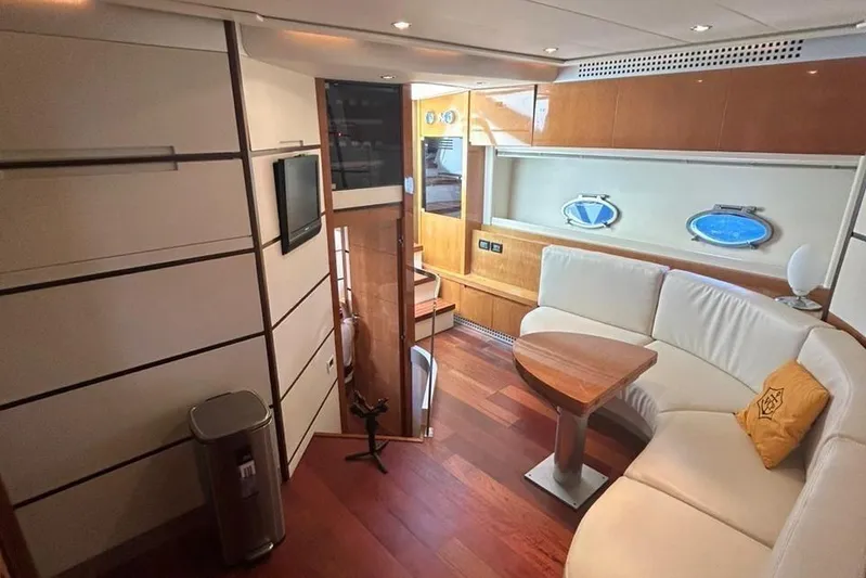  Yacht Photos Pics Luxurious interior of 2007 Pershing 62 yacht with elegant seating and modern decor.