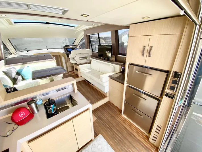 Revenant Yacht Photos Pics Luxurious interior of a 2015 Monte Carlo MC5S yacht with modern amenities.