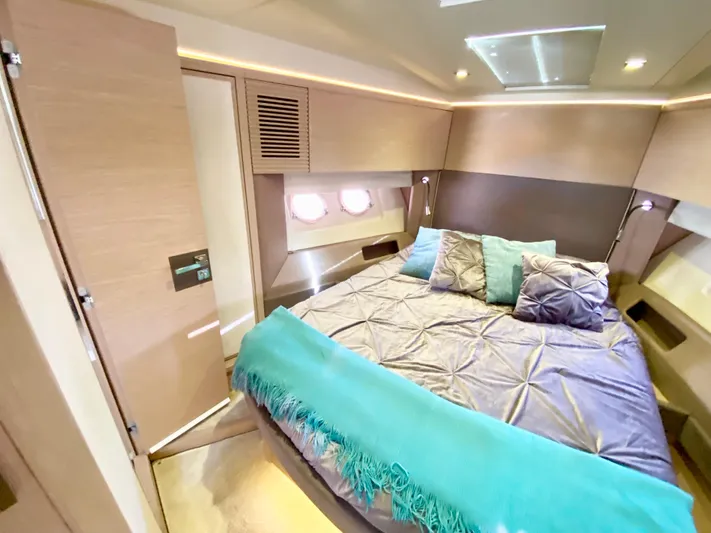 Revenant Yacht Photos Pics Luxurious 2015 Monte Carlo MC5S yacht bedroom with modern decor and cozy bedding.