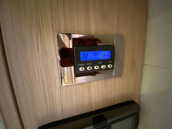 Revenant Yacht Photos Pics Digital thermostat on Monte Carlo MC5S yacht, 2015 model, displaying temperature settings.