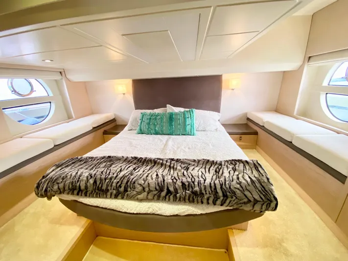 Revenant Yacht Photos Pics Luxurious 2015 Monte Carlo MC5S yacht bedroom with elegant bedding and ambient lighting.