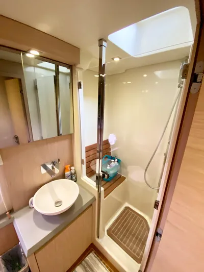 Revenant Yacht Photos Pics 2015 Monte Carlo MC5S yacht bathroom with modern sink and shower.