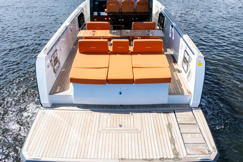  Yacht Photos Pics 2020 Fjord 44 Open yacht with orange seating, spacious deck, and sleek design on water.