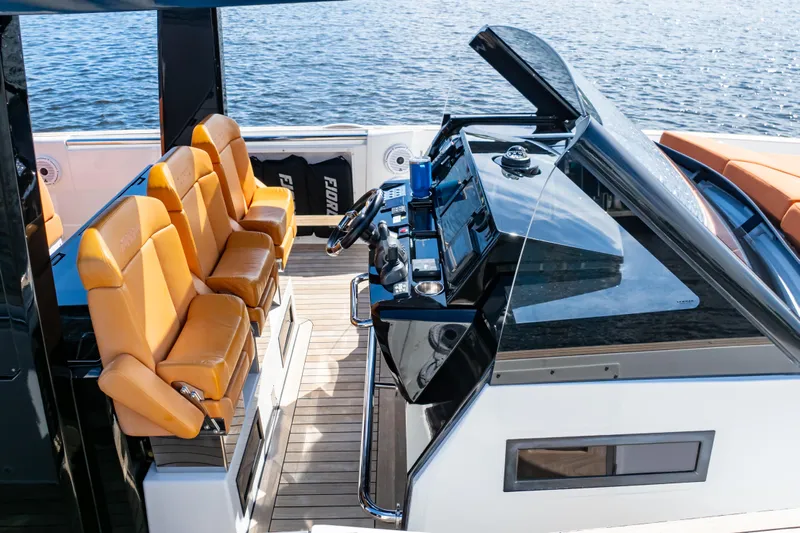  Yacht Photos Pics Luxurious 2020 Fjord 44 Open yacht cockpit with leather seats and modern controls.