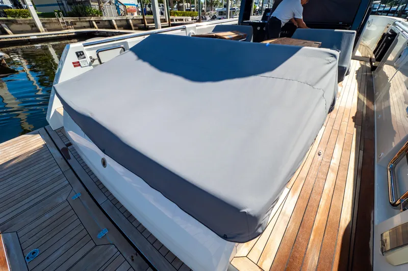  Yacht Photos Pics 2020 Fjord 44 Open yacht with covered seating area on teak deck.