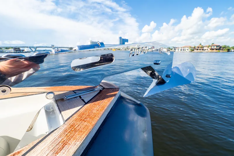  Yacht Photos Pics Sleek 2020 Fjord 44 Open yacht detail with polished metal and wooden deck.