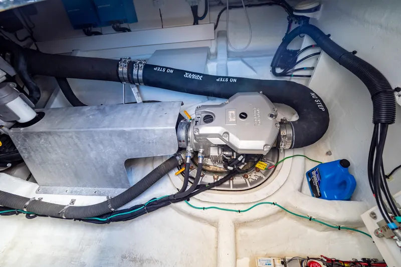  Yacht Photos Pics Engine compartment of 2020 Fjord 44 Open boat, showcasing mechanical components and wiring.