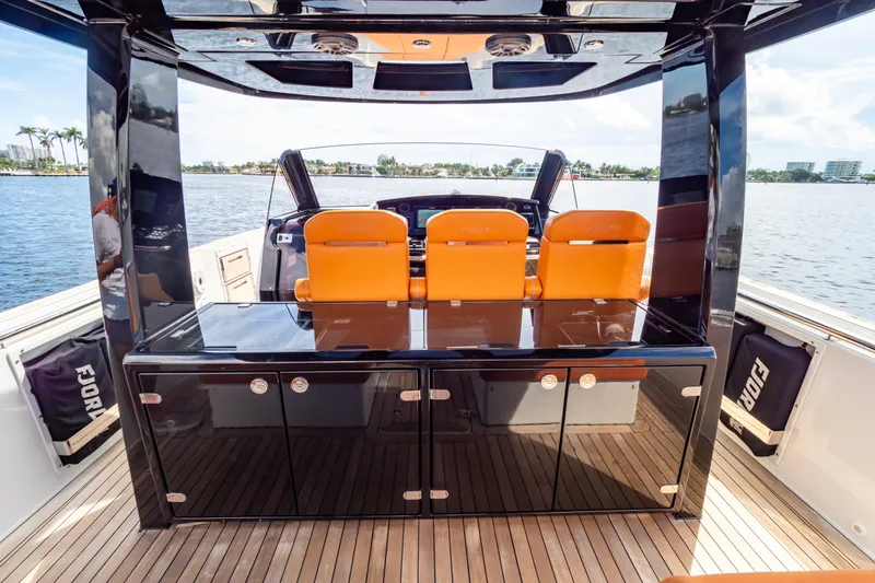  Yacht Photos Pics 2020 Fjord 44 Open yacht with sleek design and vibrant orange seating.