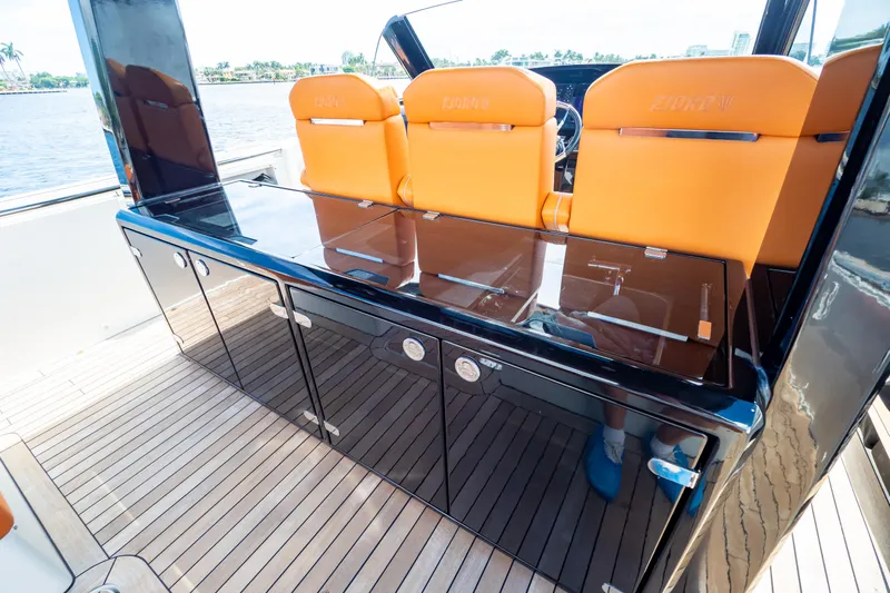  Yacht Photos Pics Luxury seating and cabinetry on 2020 Fjord 44 Open yacht deck.