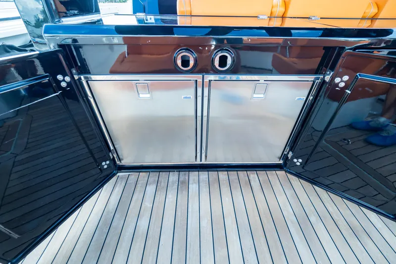  Yacht Photos Pics Luxury yacht kitchen area with stainless steel appliances on a 2020 Fjord 44 Open.